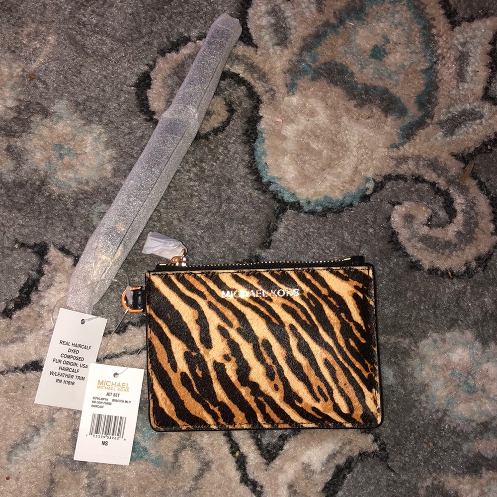 Cheetah print wallet / wristlet Michael Kors